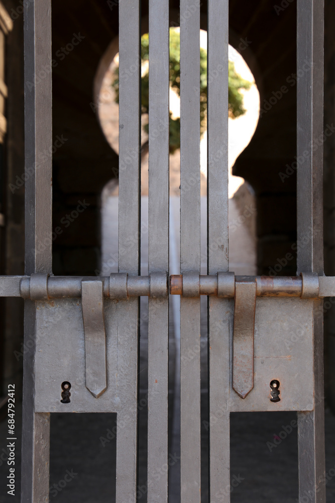 Wrought iron door of the Trujillo (Alcazaba) castle in Trujillo town, Caceres Wrought iron door of the Trujillo (Alcazaba) castle in Trujillo town, Caceres