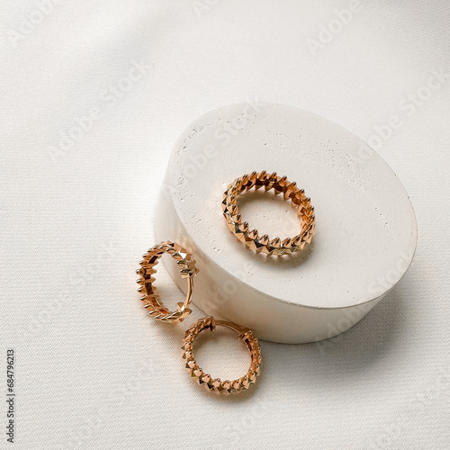 Earrings and ring in 14k pink gold with spikes designed to be worn together. 