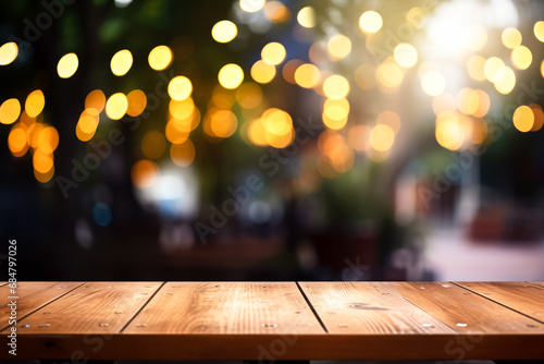 Wooden table in front of blurred background of cafe or restaurant.