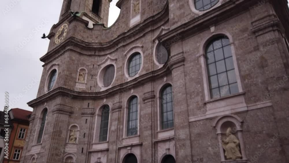 DOLLY SHOT - The St. James Cathedral, or Innsbruck Cathedral, is an eighteenth-century Baroque cathedral of the Roman Catholic Diocese of Innsbruck in the city of Innsbruck, Austria. DOLLY SHOT - The St. James Cathedral, or Innsbruck Cathedral, is an eighteenth-century Baroque cathedral of the Roman Catholic Diocese of Innsbruck in the city of Innsbruck, Austria.