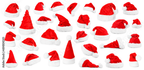 Set of many Santa hats isolated on white