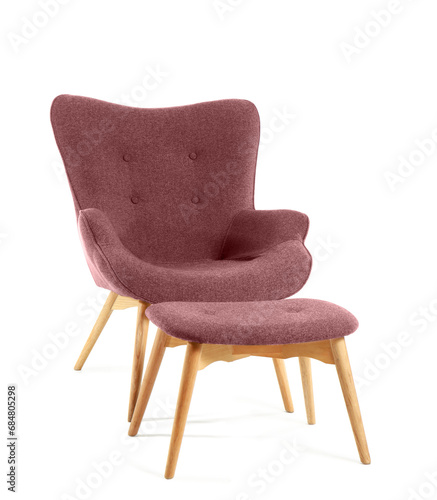 Modern pink armchair with ottoman on white background