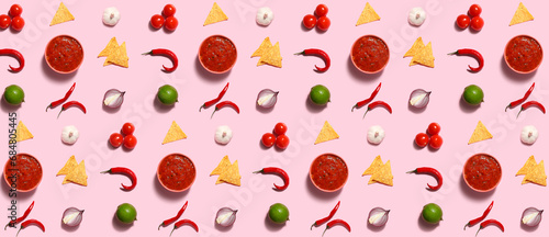 Bowl of tasty salsa sauce with ingredients on color background