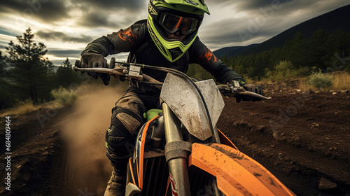 Motorcyclist's focus on challenging off-road trail natural colors controlled intensity