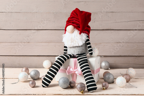 Christmas gnome with gift b...