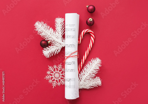 Rolled music note sheets wi...