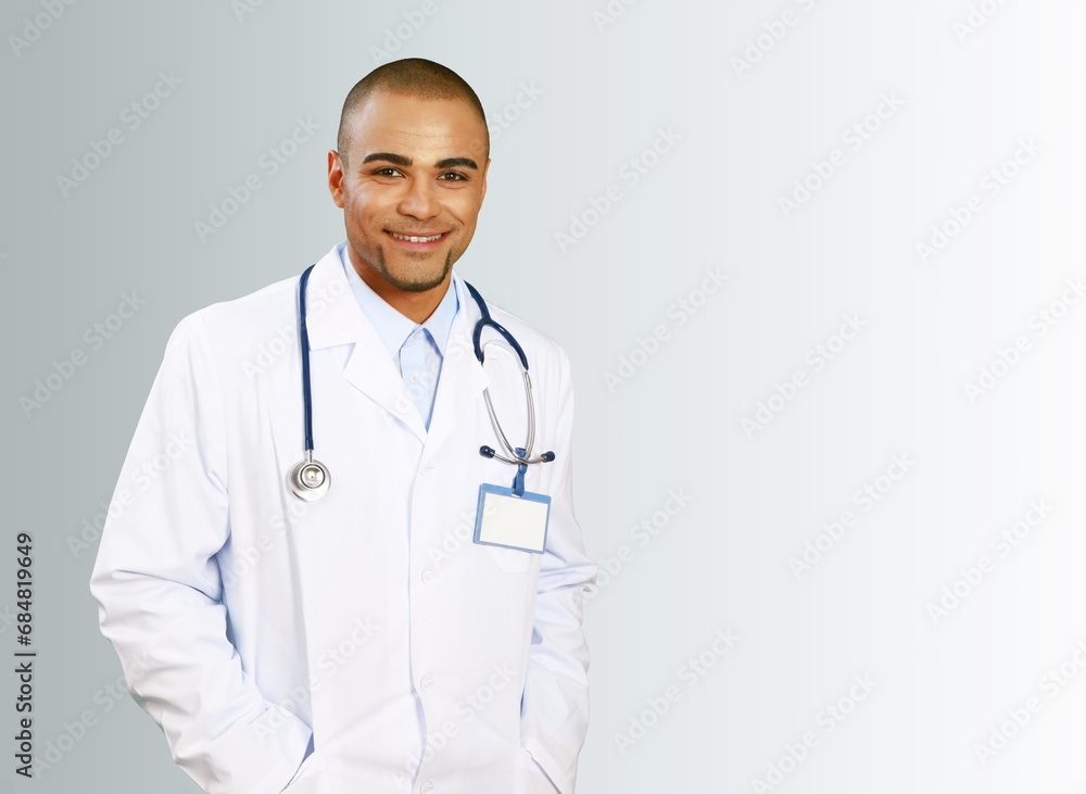 Man doctor in white coat on medical background Man doctor in white coat on medical background