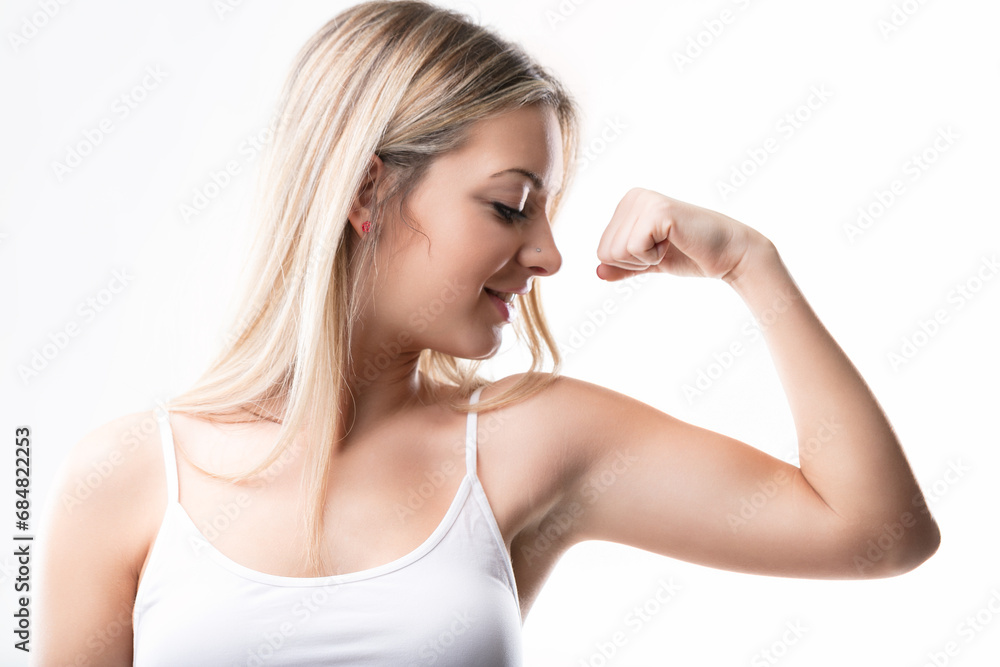 Woman's confident display of strength Woman's confident display of strength