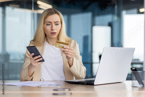 Fotografie Frustrated sad upset woman working inside office, cheated business woman refused