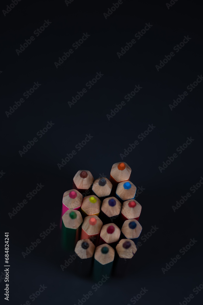 macro of crayons. close-up of sharpened crayons, tips of crayons on a black background macro of crayons. close-up of sharpened crayons, tips of crayons on a black background
