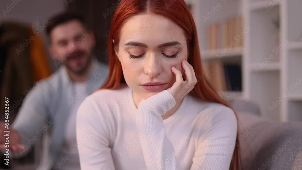Portrait of young woman feeling stress and pressure from her husband or boyfriend while he screaming at her Sad male suffering from depression anxiety loneliness or mental health problem Home abuse Portrait of young woman feeling stress and pressure from her husband or boyfriend while he screaming at her Sad male suffering from depression anxiety loneliness or mental health problem Home abuse