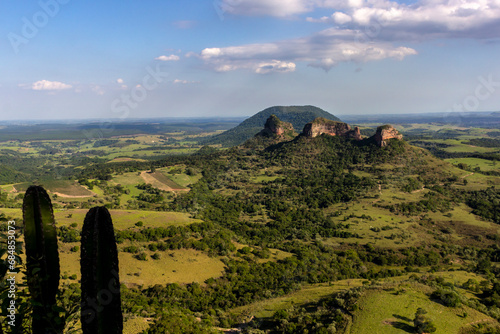 View of the rock formation known as Três Pedras, a set of testimonial hills, located in the rural area of the municipality of Bofete, tourist region of Polo Cuesta, interior of São Paulo, Brazil photo