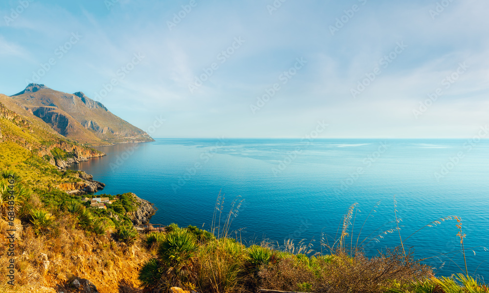 Fototapeta premium Paradise sea landscape from coastline trail of Zingaro Nature Reserve Park, between San Vito lo Capo and Scopello, Trapani province, Sicily, Italy.
