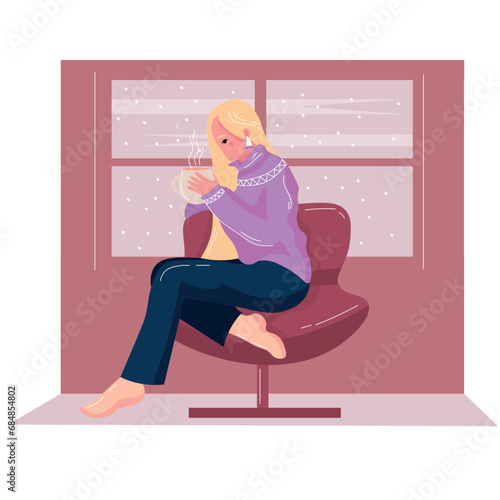 Woman drinking hot tea near window on winter day