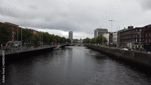 Wallpaper Mural Dublin, Ireland, August 27, 2023: DOLLY SHOT - Dublin cityscape with River Liffey, O'Connell Bridge, Liberty Hall skyscraper (tallest building in Dublin) and Custom House. Torontodigital.ca