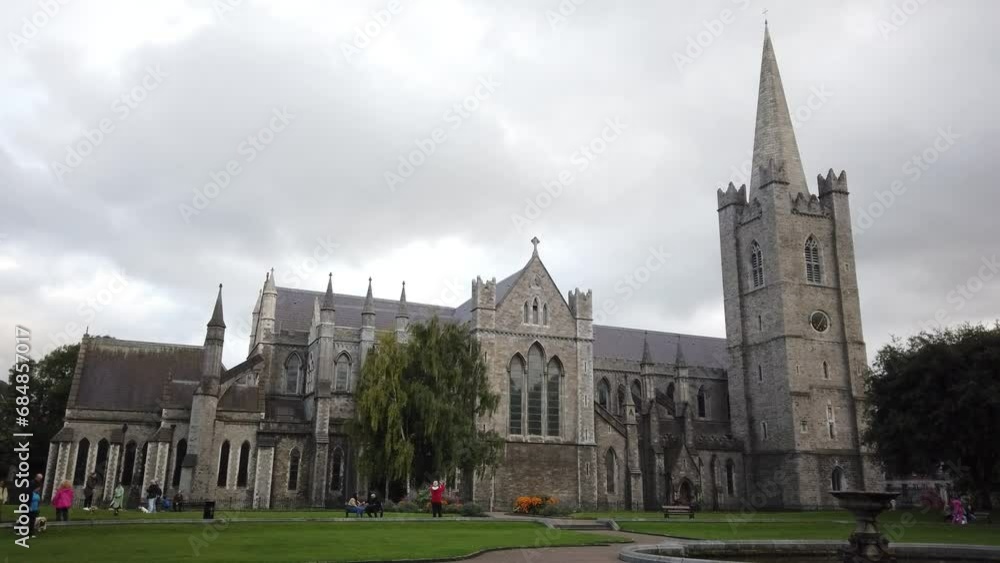Dublin, Ireland, August 27, 2023: Saint Patrick's Cathedral and Collegiate Church, founded in 1191 as a Roman Catholic cathedral, view from St. Patrick’s Park. Dublin, Ireland, August 27, 2023: Saint Patrick's Cathedral and Collegiate Church, founded in 1191 as a Roman Catholic cathedral, view from St. Patrick’s Park.