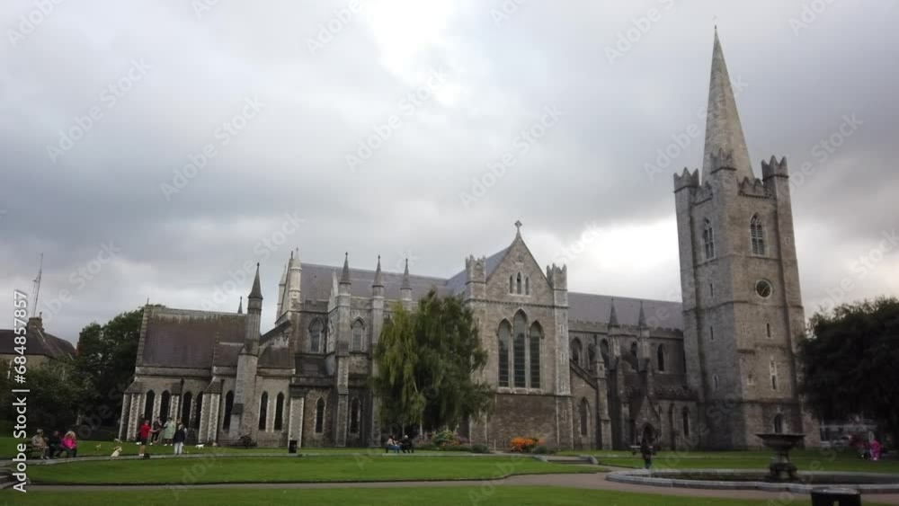 Dublin, Ireland, August 27, 2023: Saint Patrick's Cathedral and Collegiate Church, founded in 1191 as a Roman Catholic cathedral, view from St. Patrick’s Park. Dublin, Ireland, August 27, 2023: Saint Patrick's Cathedral and Collegiate Church, founded in 1191 as a Roman Catholic cathedral, view from St. Patrick’s Park.