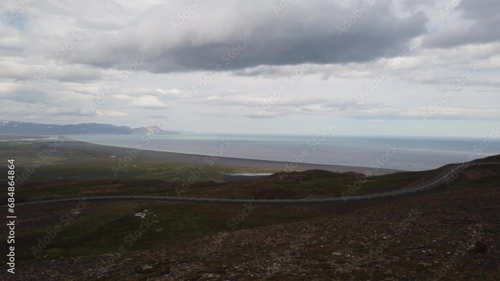 Heradhssandur black sand beach, Heradsfloi Bay and Fljótsdalur valley in Múlaþing, East Iceland. Heradssandur is situated nearby to the localities Landsendi and Ker. Heradhssandur black sand beach, Heradsfloi Bay and Fljótsdalur valley in Múlaþing, East Iceland. Heradssandur is situated nearby to the localities Landsendi and Ker.
