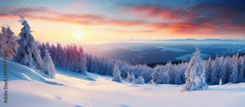 Gorgeous scenic winter sunset on a hill. photo