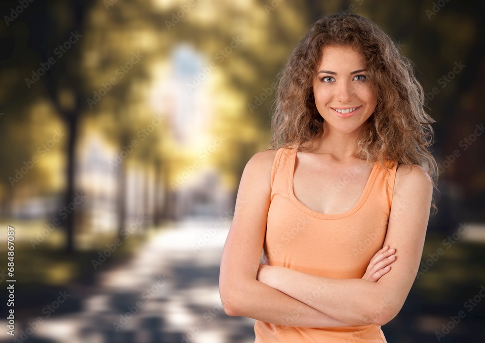 Portrait of cheerful young woman in the autumn park Portrait of cheerful young woman in the autumn park
