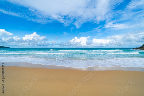 Beautiful sea beach background,Amazing sea ocean in good weather day,Beautiful waves crashing on sandy shore Nature beach sand background © panya99