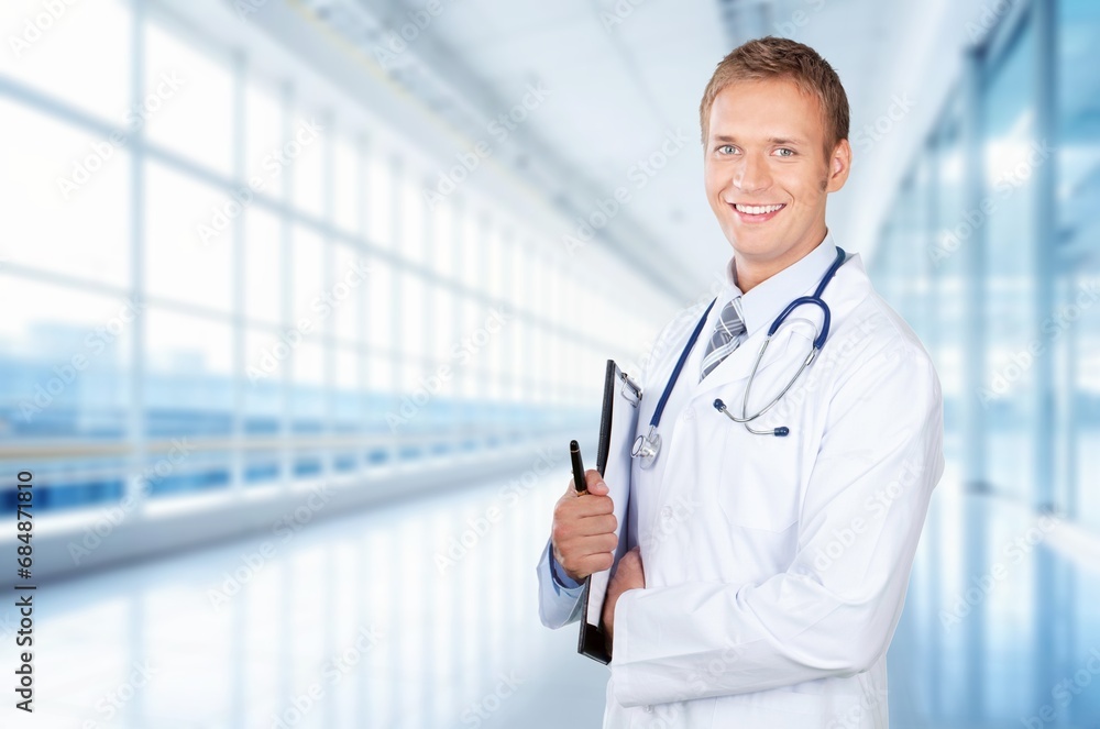 Professional happy general practitioner in clinic. Professional happy general practitioner in clinic.
