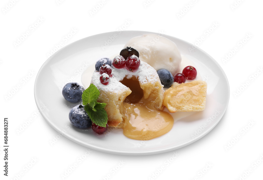 Tasty vanilla fondant with white chocolate, berries and ice cream isolated on white Tasty vanilla fondant with white chocolate, berries and ice cream isolated on white
