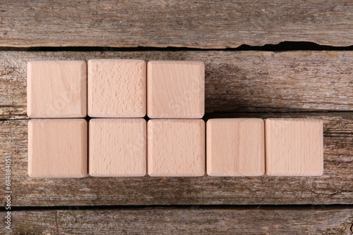 International Organization for Standardization. Cubes with abbreviation ISO 22000 on wooden table  top view