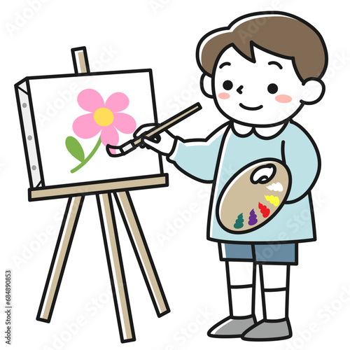 絵筆を持って絵を描く男の子