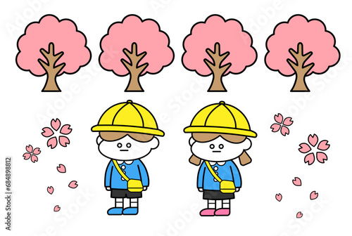 桜の下を歩く幼稚園児