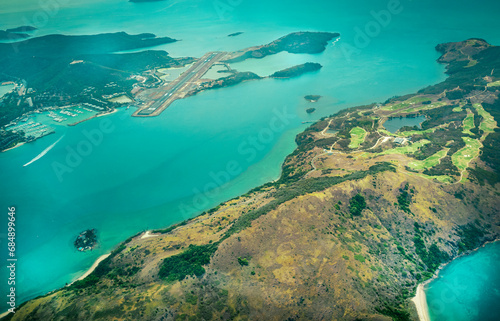 Fototapeta Naklejka Na Ścianę i Meble -  Aerial view of the Whitsunday Islands, in the Great Barrier Reef, the world's largest coral reef  system located in the Coral Sea, coast of Queensland, Australia. Dec 2019