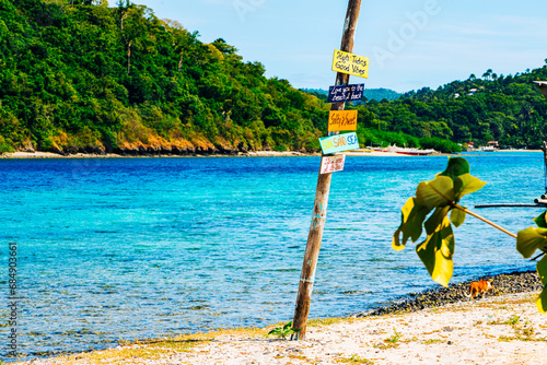 a resort, picnic, information board, palm tree,