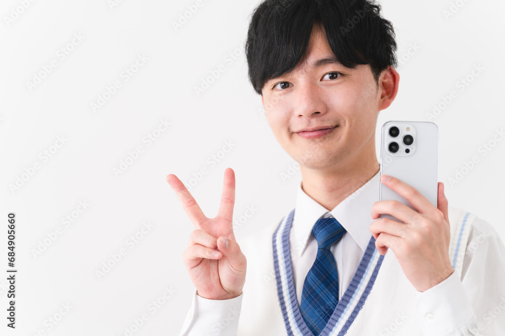 学生服を着ている若い男性　学生イメージ