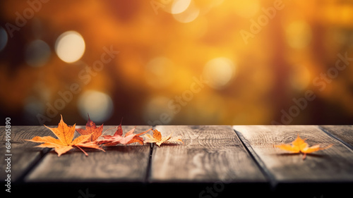 autumn podium table top against the background of a blurred autumn park in yellow tones and leaves. © kichigin19