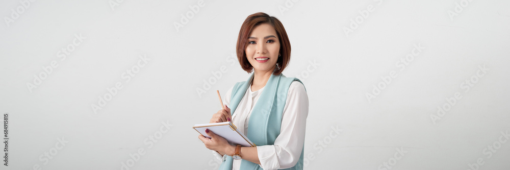 Banner of corporate woman holding clipboard at work, standing in formal outfit over white background Banner of corporate woman holding clipboard at work, standing in formal outfit over white background