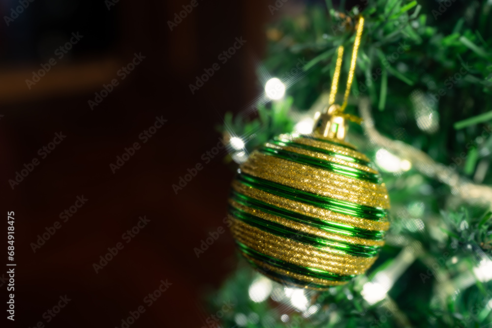 Fotografie Christmas tree with bauble decorations and lights background