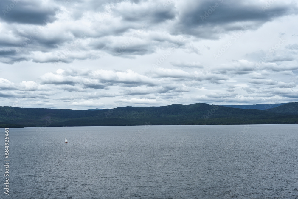 Cloud day landscape of the Turgoyak lake