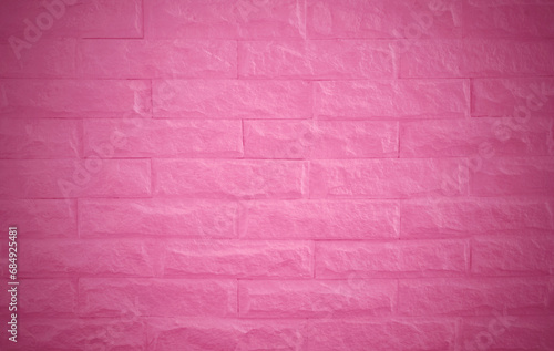 Pink brick wall texture with vintage style pattern for background and design art work.