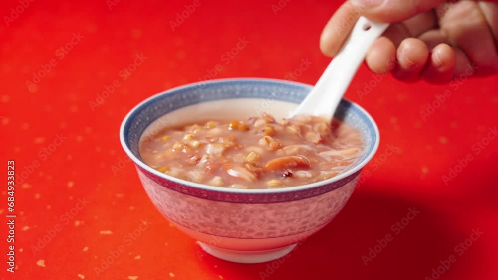 Chinese traditional food, Laba porridge.red rice porridge in a bowl. Chinese traditional food, Laba porridge.red rice porridge in a bowl.