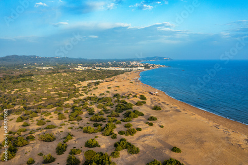 Aerial drone view over sand dunes close to Lake Korission. It is located in the southern part of Greek island of Corfu, Greece. © daliu