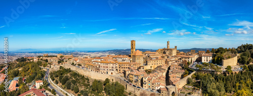 Tuscany, Volterra town skyline, church and panorama view. Maremma, Italy, Europe. Panoramic view of Volterra, medieval Tuscan town with old houses, towers and churches, Tuscany, Italy. photo