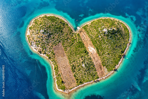 Aerial view of the heart shaped Galesnjak island on the adriatic coast, Zadar, Croatia. Heart shaped island of Galesnjak in Zadar archipelago aerial view, Dalmatia region of Croatia.