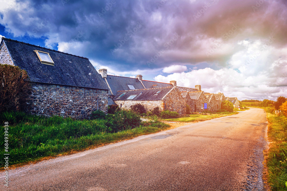 Fototapeta premium Street view of beautiful village of Rostudel former fishing village, Parc naturel regional d'Armorique. Finistere department, Camaret-sur-Mer. Brittany (Bretagne), France.