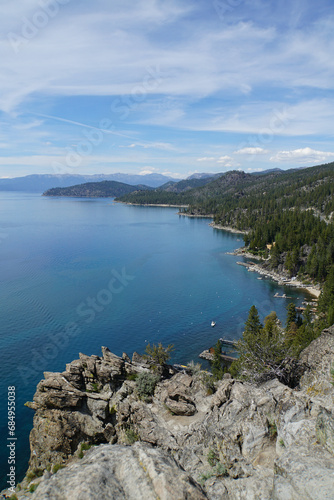 Scenic view of mountains and forested coastline of the East Shore of Lake Tahoe from the top of Cave Rock, Nevada 