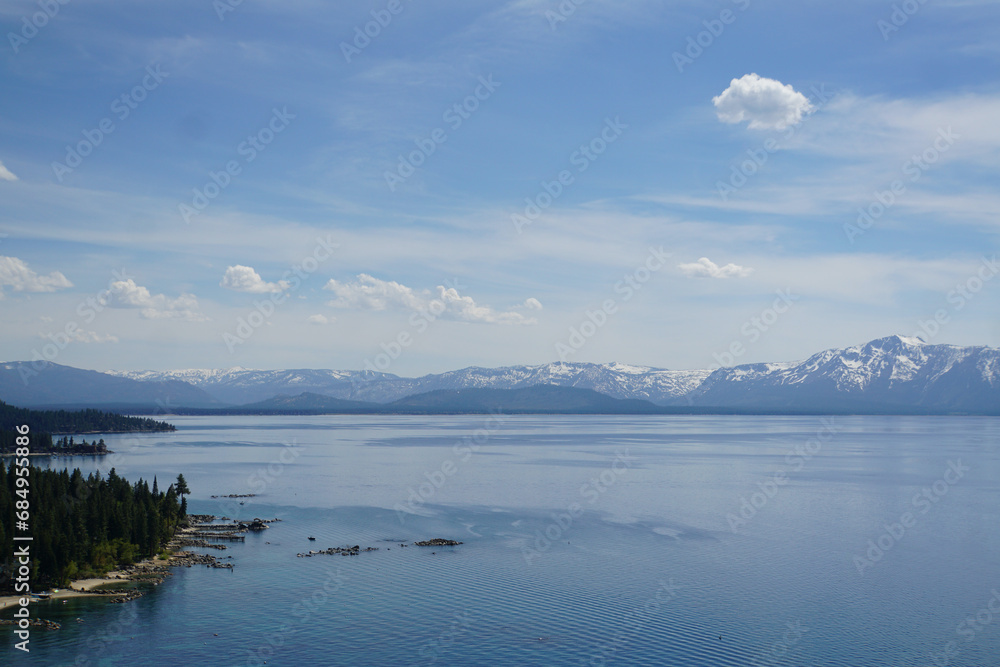 Scenic view of mountains and forested coastline of the East Shore of Lake Tahoe from the top of Cave Rock, Nevada     