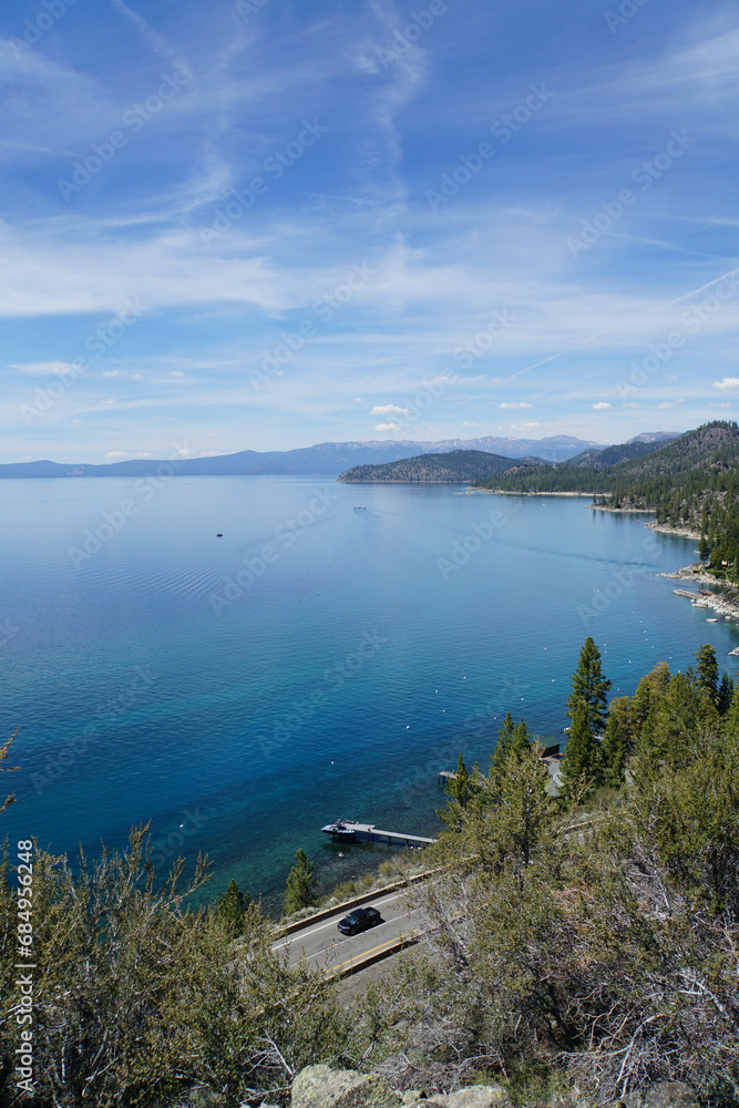 Obraz premium Scenic view of mountains and forested coastline of the East Shore of Lake Tahoe from the top of Cave Rock, Nevada 