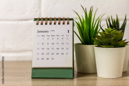 Hello January. Planning calendar for January 2024 on the desktop.