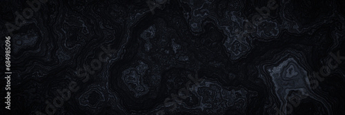 Abstract black cooled lava. Black volcanic rock background. photo