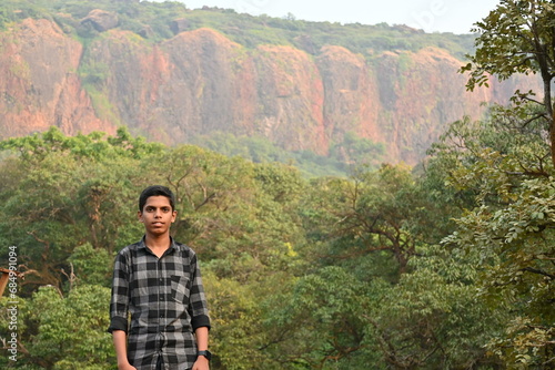 close up of young Indian boy in jungle 