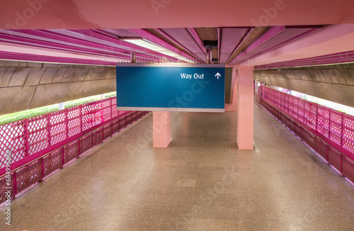 Photography Way out sign in the Pink train station in Singapore